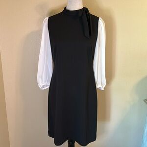 Calvin Klein classy black and white mini dress with tie at neck